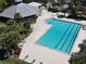 Aerial view of a community pool with ample lounge seating and sunbathing area, a refreshing escape in the neighborhood at 2519 Cypress Trace Cir, Orlando, FL 32825