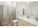 Well-lit bathroom with glass shower and modern vanity at 2967 Latitude Ln, Kissimmee, FL 34747