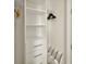Organized closet with built-in shelving and drawers at 2967 Latitude Ln, Kissimmee, FL 34747