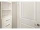 Well-organized closet featuring built-in shelving and drawers for optimal storage solutions at 2967 Latitude Ln, Kissimmee, FL 34747
