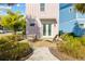 Cozy patio area with outdoor seating, lounge chairs, and lush landscaping at 2967 Latitude Ln, Kissimmee, FL 34747