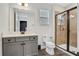 Stylish bathroom with granite counters, walk-in shower and modern fixtures at 3083 Pirate Way, Kissimmee, FL 34747