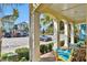 Inviting front porch with plenty of seating, perfect for enjoying the outdoors in this community at 3083 Pirate Way, Kissimmee, FL 34747