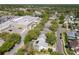 Aerial view showing a neighborhood with mature trees, easy access to shopping centers and local amenities at 358 Morning Creek Cir, Apopka, FL 32712