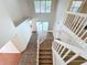 Grand foyer with high ceilings, staircase, and natural light at 358 Morning Creek Cir, Apopka, FL 32712