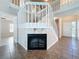 Inviting foyer featuring fireplace, staircase and tile floors at 358 Morning Creek Cir, Apopka, FL 32712