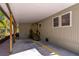 Spacious carport featuring storage and convenient access to the home's entrance at 410 N Niblick Ln, Lake Mary, FL 32746