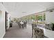 Spacious clubhouse features dining tables, comfortable seating, and natural light at 410 N Niblick Ln, Lake Mary, FL 32746