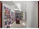 Community library with floor-to-ceiling bookshelves and well-stocked book collection at 410 N Niblick Ln, Lake Mary, FL 32746