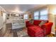 Comfortable living room featuring hardwood floors, lots of natural light and direct access to the dining area at 410 N Niblick Ln, Lake Mary, FL 32746
