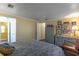Spacious main bedroom features wood-look vinyl floors and dual dressers, providing ample storage space at 410 N Niblick Ln, Lake Mary, FL 32746