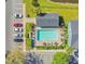 Aerial view of the pool, parking, and common area at 4314 Pershing Pointe Pl # 4, Orlando, FL 32822