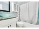 Modern bathroom with a glass vessel sink and shower-tub combination at 4314 Pershing Pointe Pl # 4, Orlando, FL 32822