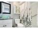 Well-maintained bathroom with granite countertop and shower-tub combination at 4314 Pershing Pointe Pl # 4, Orlando, FL 32822