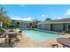 Relax at the community pool with ample seating and a nearby lounge area at 4314 Pershing Pointe Pl # 4, Orlando, FL 32822