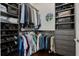 Organized walk-in closet with custom shelving and drawers for optimal storage solutions at 504 Sonata Ct, Winter Springs, FL 32708