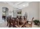 Dining area featuring a decorative light fixture, and seating for eight at 504 Sonata Ct, Winter Springs, FL 32708