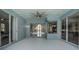 Expansive covered lanai with sliding glass doors offering views of the pool and patio at 504 Sonata Ct, Winter Springs, FL 32708
