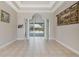 Open living room with tile flooring, recessed lighting, decorative columns, and views of the pool area at 504 Sonata Ct, Winter Springs, FL 32708