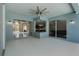 Enclosed patio with multiple sliding glass doors providing access to various areas of the home at 504 Sonata Ct, Winter Springs, FL 32708