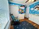 Bedroom featuring cloud-themed walls and white furniture at 511 Terrier Way, New Smyrna Beach, FL 32168