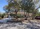 Cozy single story home with mature trees and a driveway, offering great curb appeal at 511 Terrier Way, New Smyrna Beach, FL 32168