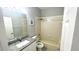 Bathroom featuring granite countertops, tile flooring, framed mirror and bathtub at 5123 Santa Ana Dr, Orlando, FL 32837