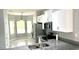 Open concept kitchen with stainless steel appliances and granite countertops at 5123 Santa Ana Dr, Orlando, FL 32837