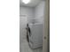 Laundry room with washer, dryer, and shelving for storage at 5123 Santa Ana Dr, Orlando, FL 32837