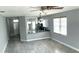 Bright living room with kitchen view and plenty of natural light at 5123 Santa Ana Dr, Orlando, FL 32837