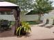 A covered patio space with outdoor dining set and lounge chairs at 5123 Santa Ana Dr, Orlando, FL 32837
