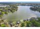 Expansive lake view showcasing waterfront properties with docks and lush green surroundings at 533 Baxter St, Orlando, FL 32806