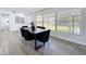 Dining area features a table with seating and view from a large window at 533 Baxter St, Orlando, FL 32806