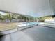 Enclosed patio overlooking a backyard pool, perfect for relaxing and entertaining guests at 533 Baxter St, Orlando, FL 32806