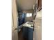 Cozy bathroom featuring a vanity with storage and tiled shower at 58 Magnolia Dr, Debary, FL 32713