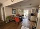 Inviting dining area with sliding glass doors and hardwood floors at 58 Magnolia Dr, Debary, FL 32713