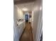Interior laundry room featuring new appliances and a linen closet for additional storage space at 58 Magnolia Dr, Debary, FL 32713