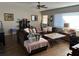 Comfortable living room with a plush sofa, hardwood floors and natural light at 58 Magnolia Dr, Debary, FL 32713