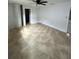 Spacious bedroom featuring tiled floors and natural light at 6130 Gamble Dr, Orlando, FL 32808