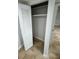 View of closet features a single rack and shelving unit at 6130 Gamble Dr, Orlando, FL 32808