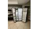 Kitchen features a large stainless steel refrigerator and black oven at 6130 Gamble Dr, Orlando, FL 32808
