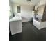 Well-lit laundry room with washer, dryer, and utilities at 6130 Gamble Dr, Orlando, FL 32808