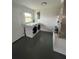 Bright laundry room featuring a washer and dryer at 6130 Gamble Dr, Orlando, FL 32808