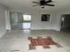 Bright living room features tiled flooring and open layout at 6130 Gamble Dr, Orlando, FL 32808