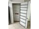 Pantry features shelving and an over the door storage rack at 6130 Gamble Dr, Orlando, FL 32808