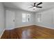 Bright living room featuring hardwood floors, lots of natural light and fan at 819 State Ave, Daytona Beach, FL 32117