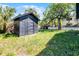 The backyard includes a shed for extra storage space at 819 State Ave, Daytona Beach, FL 32117