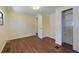 Bedroom with wood-look floors and closet at 831 Wolf Trl, Casselberry, FL 32707