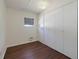 Bedroom featuring wood-look flooring and a closet at 831 Wolf Trl, Casselberry, FL 32707