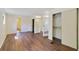 Bedroom with wood floors, closets, and an ensuite bathroom for convenience and privacy at 831 Wolf Trl, Casselberry, FL 32707